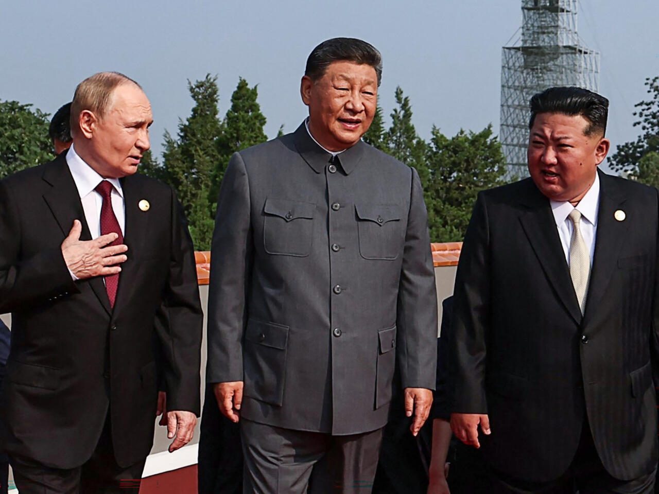 putin, kim join xi at china’s historic parade