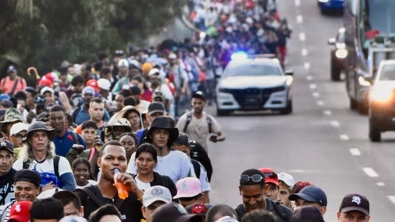 migrants march in southern mexico to demand legal status