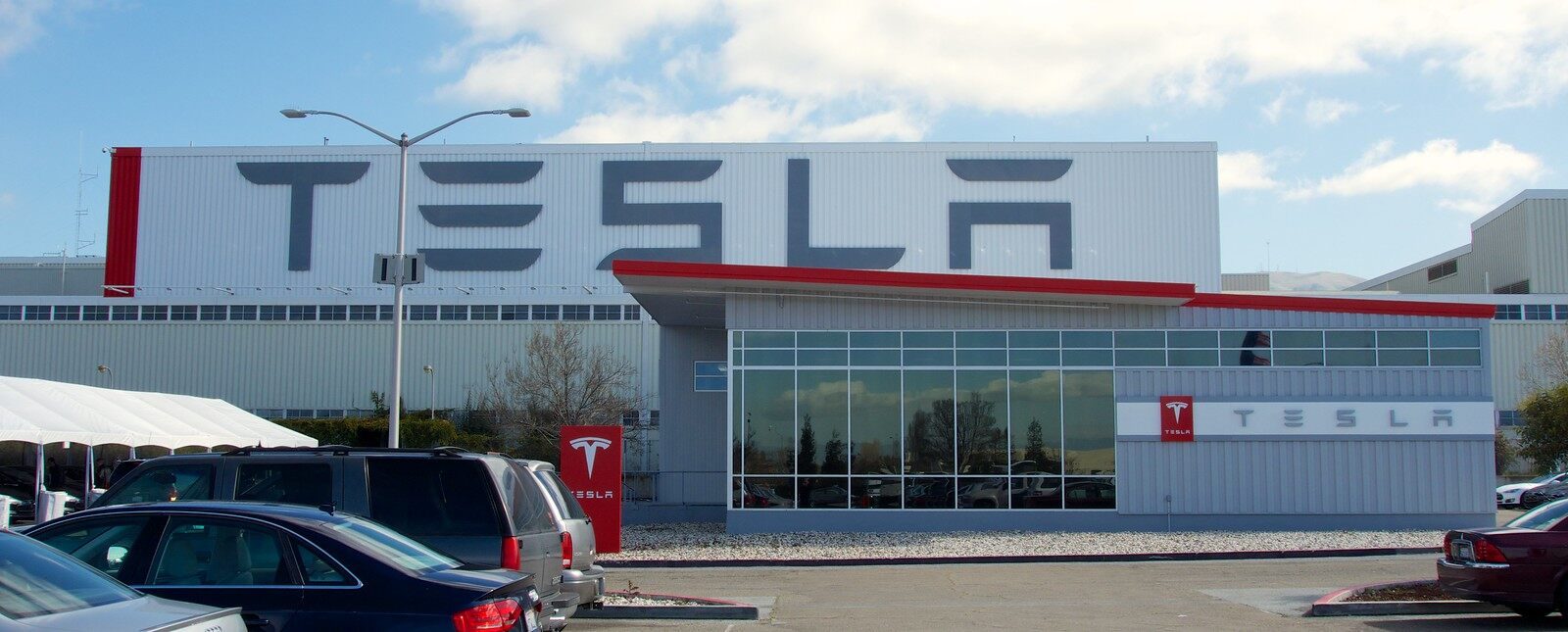 tesla faces enforcement action over insurance claim delays