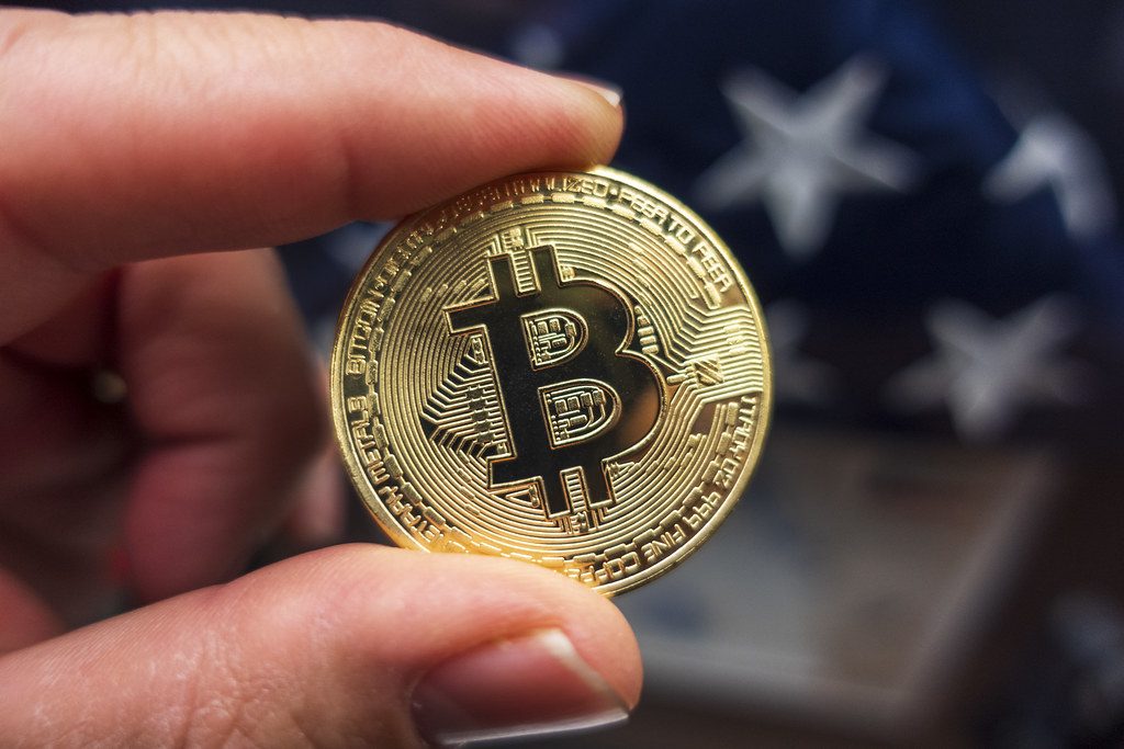 bitcoin dips under $100,000 amid market uncertainty