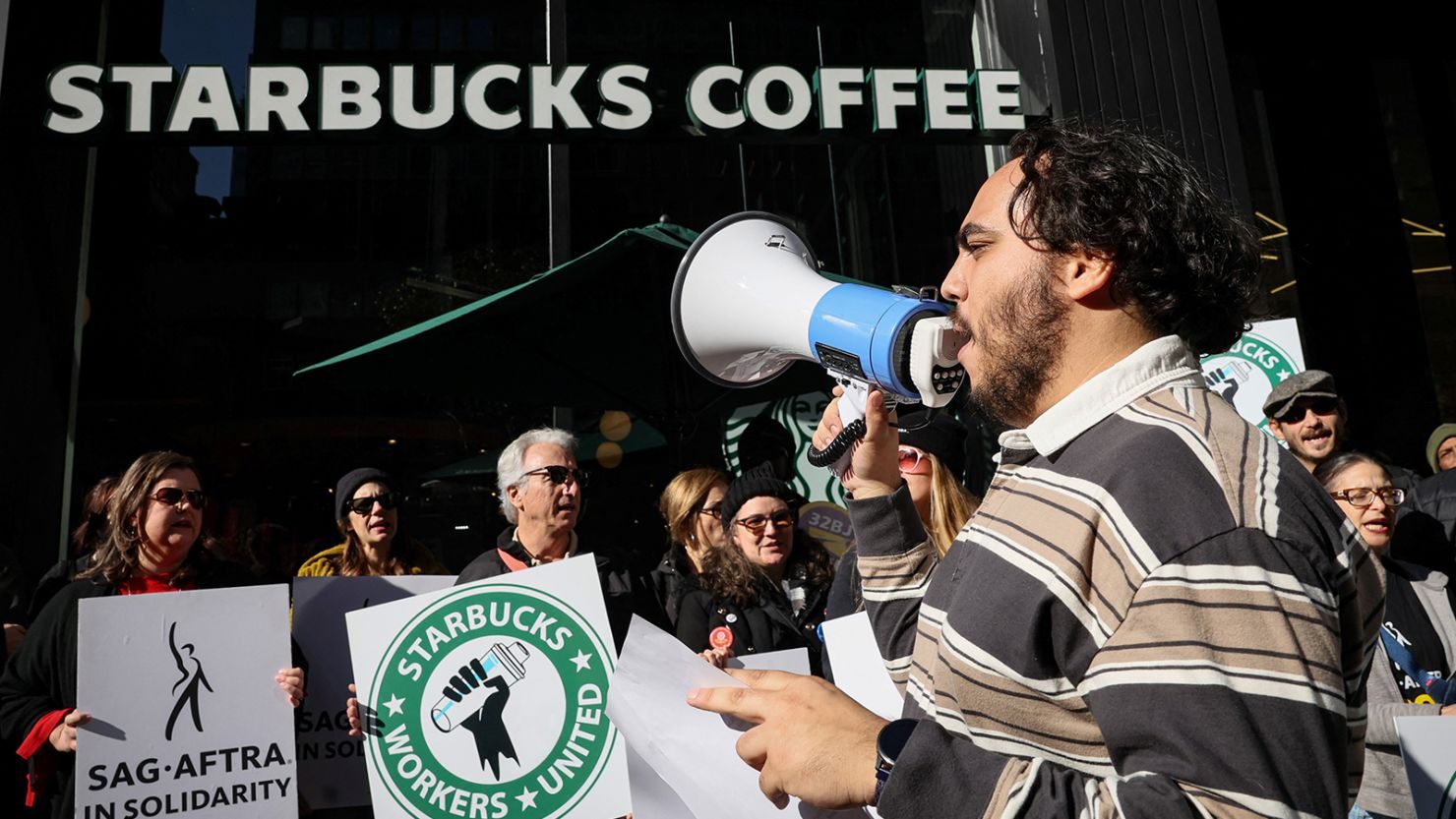 lawmakers call on starbucks to settle labour disputes quickly