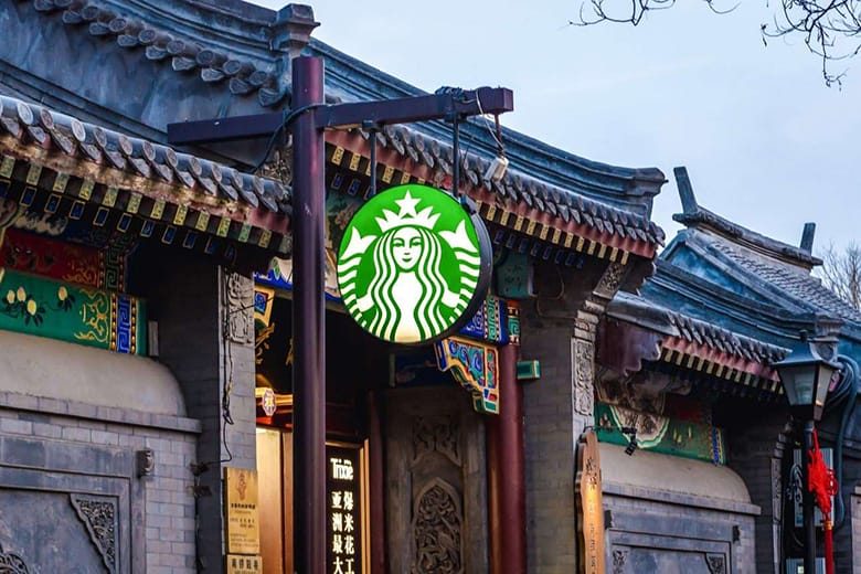 starbucks offloads majority share in china operations