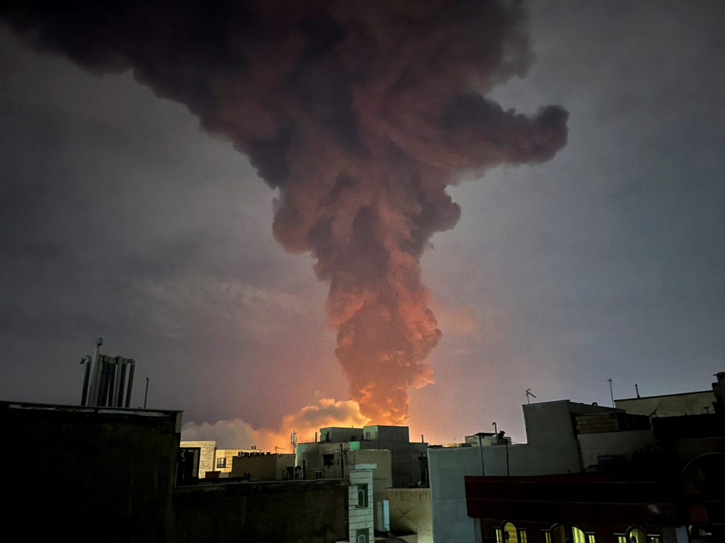 smoke rises following an explosion, amid the u.s. israeli conflict with iran, in tehran