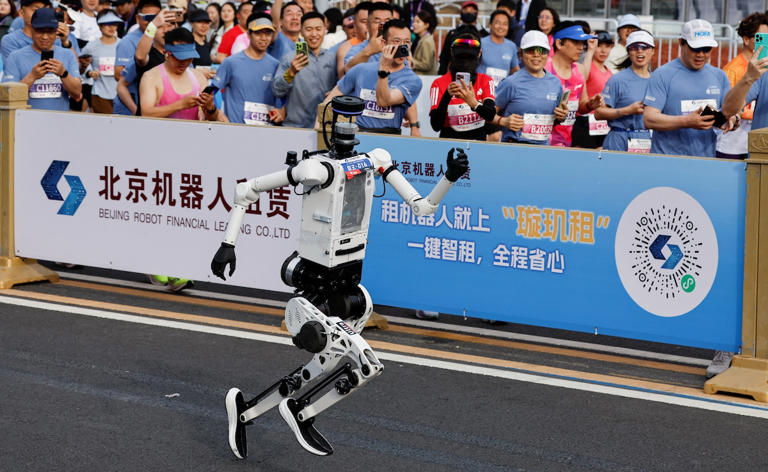 humanoid robot outpaces world record in beijing race