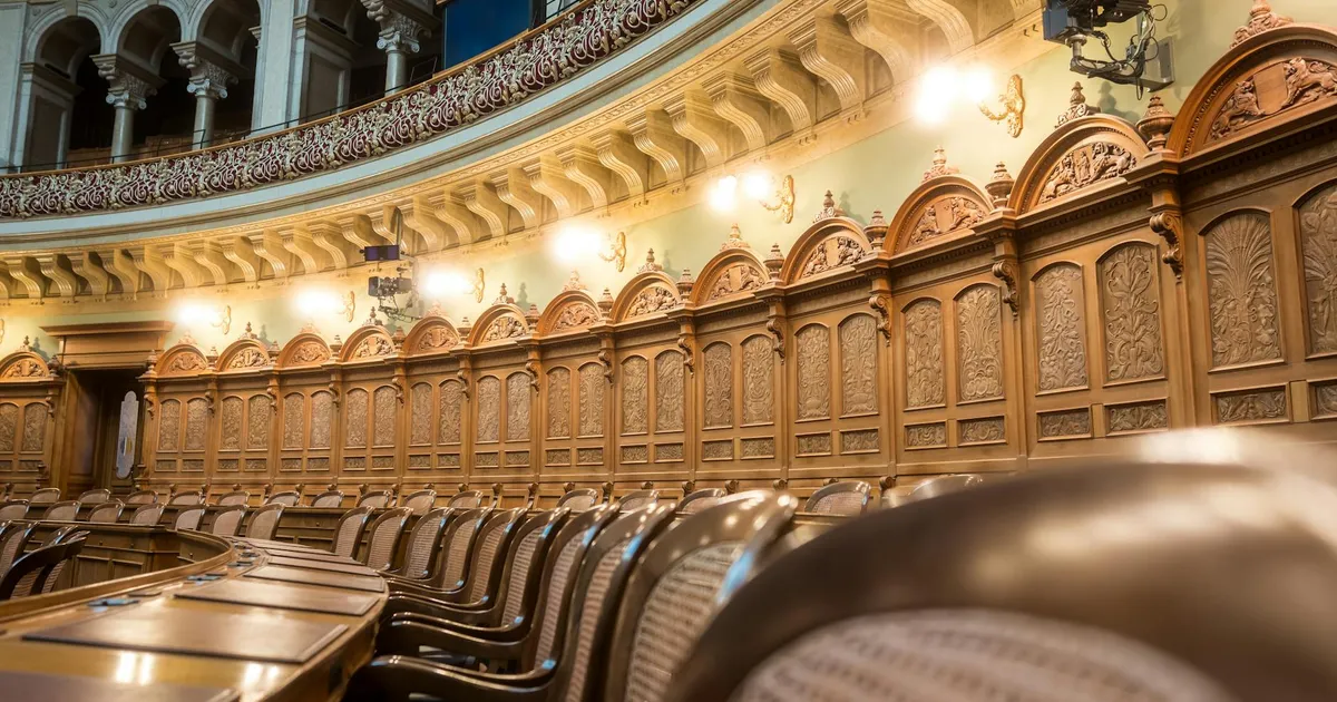 Interior view of the elegant Swiss Parliament council chamber in Bern, Switzerland.