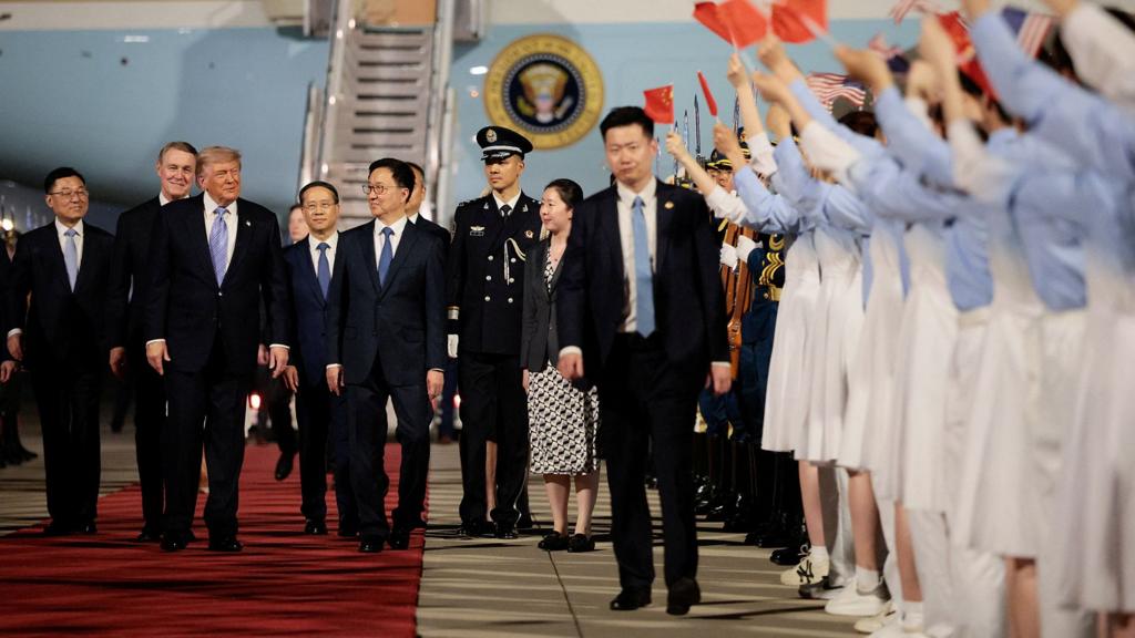 trump arrives in beijing for crucial talks with xi jinping