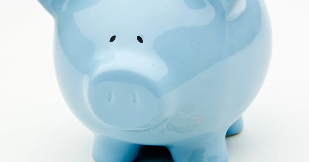 Blue Piggy Bank With Coins - Retirement