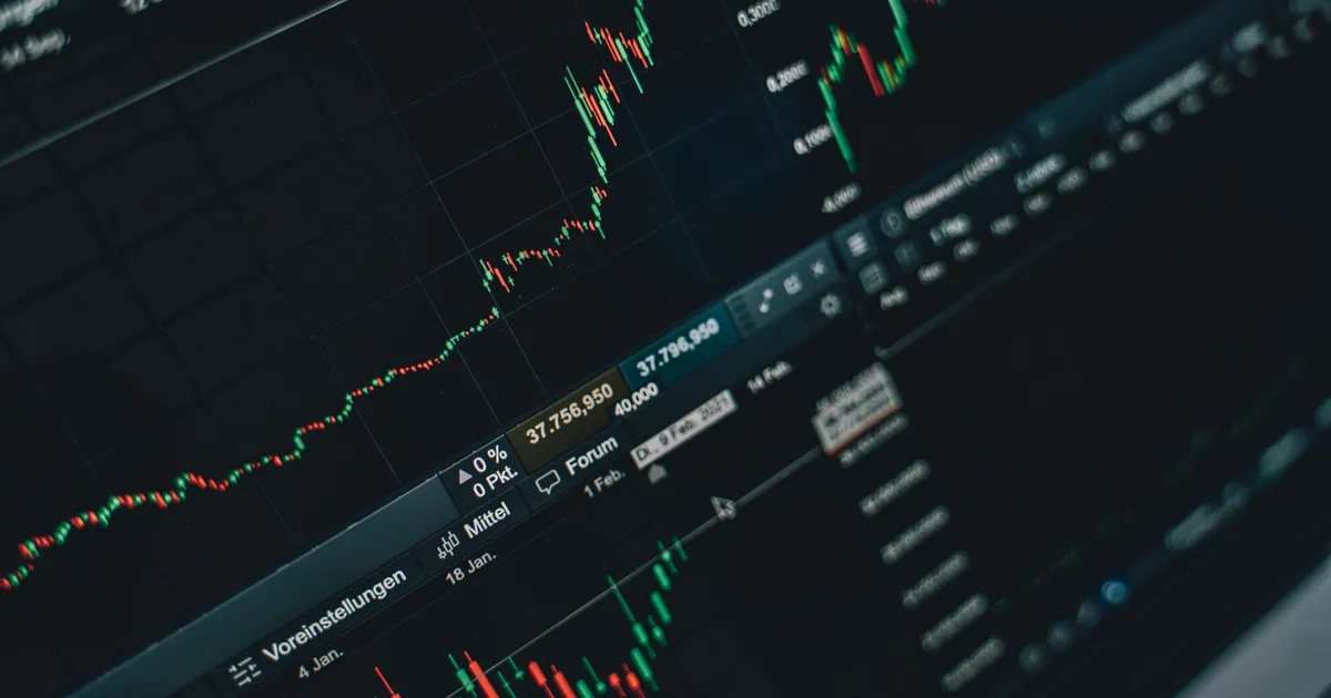 Close-up of stock market trading screen displaying financial growth and charts.