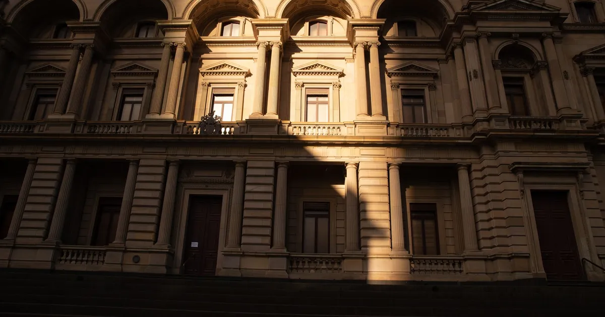 Capture of a historic building facade in Melbourne during daylight, showcasing classic architecture.