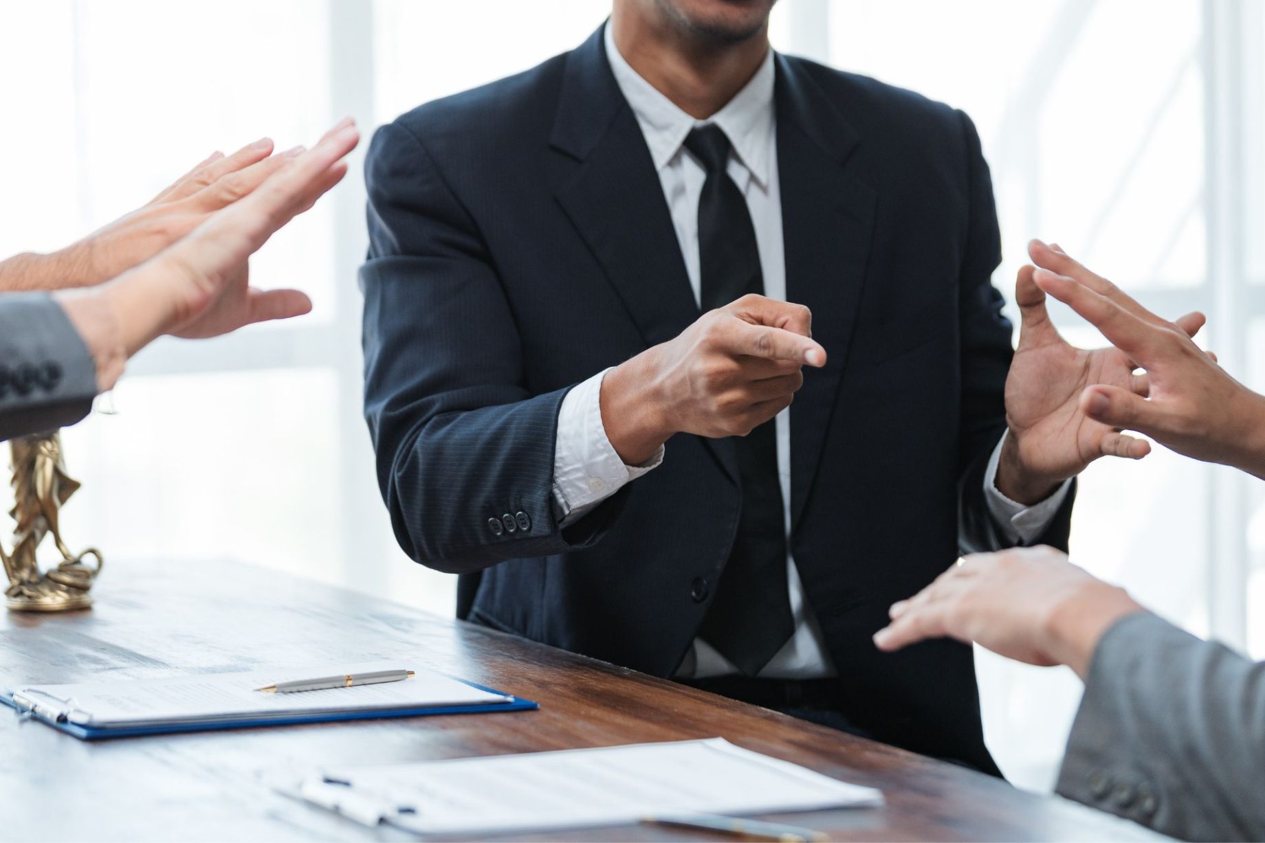 Lawyers having meeting and discussing contract