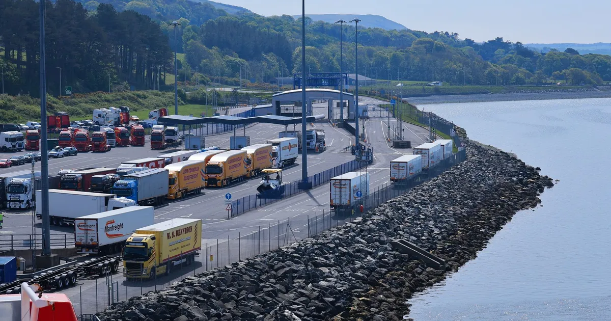Aerial view of freight trucks at Cairnryan port terminal in Scotland.