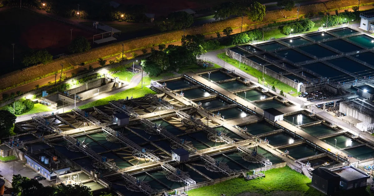 An aerial night view of a lit water treatment facility in Sanxia, Taiwan.