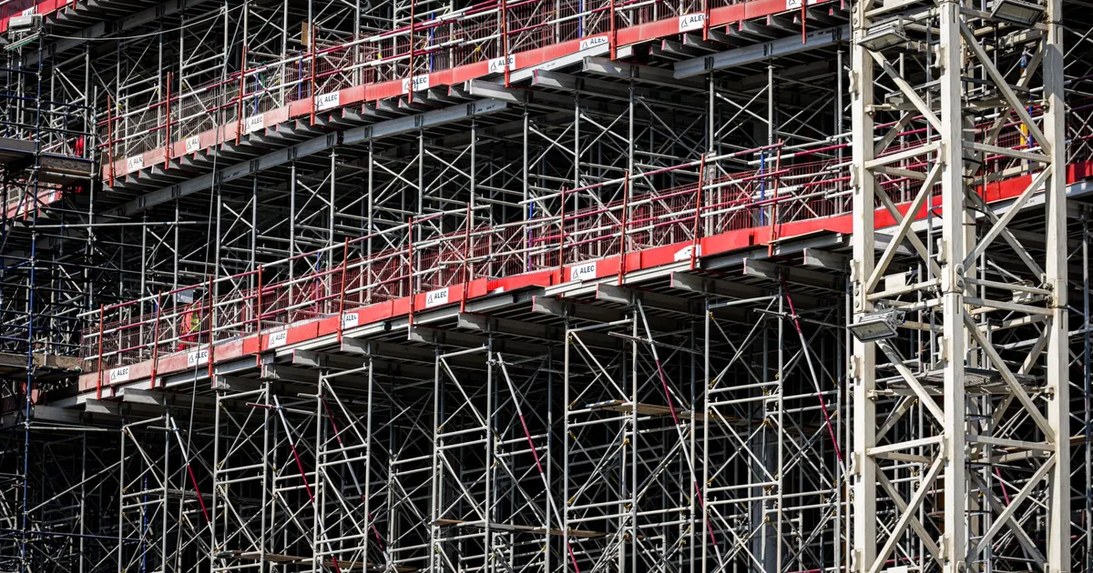 A detailed view of steel scaffolding on a construction site, showcasing architectural design.